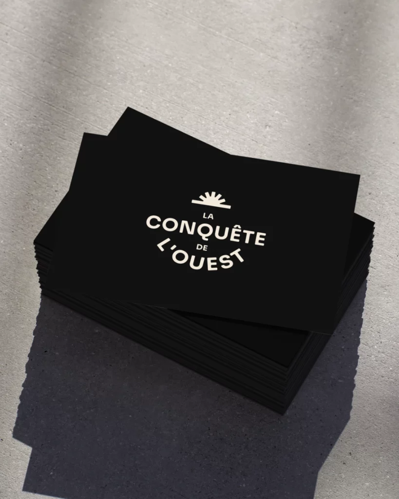 logotype la conquête de l'ouest société spectacle région studio aïe